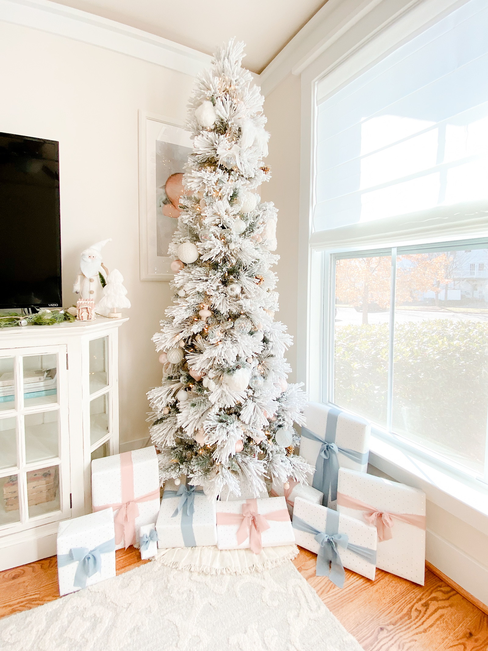 flocked Christmas tree, white Christmas tree, snow, Christmas decor, white tree with ornaments, Christmas presents